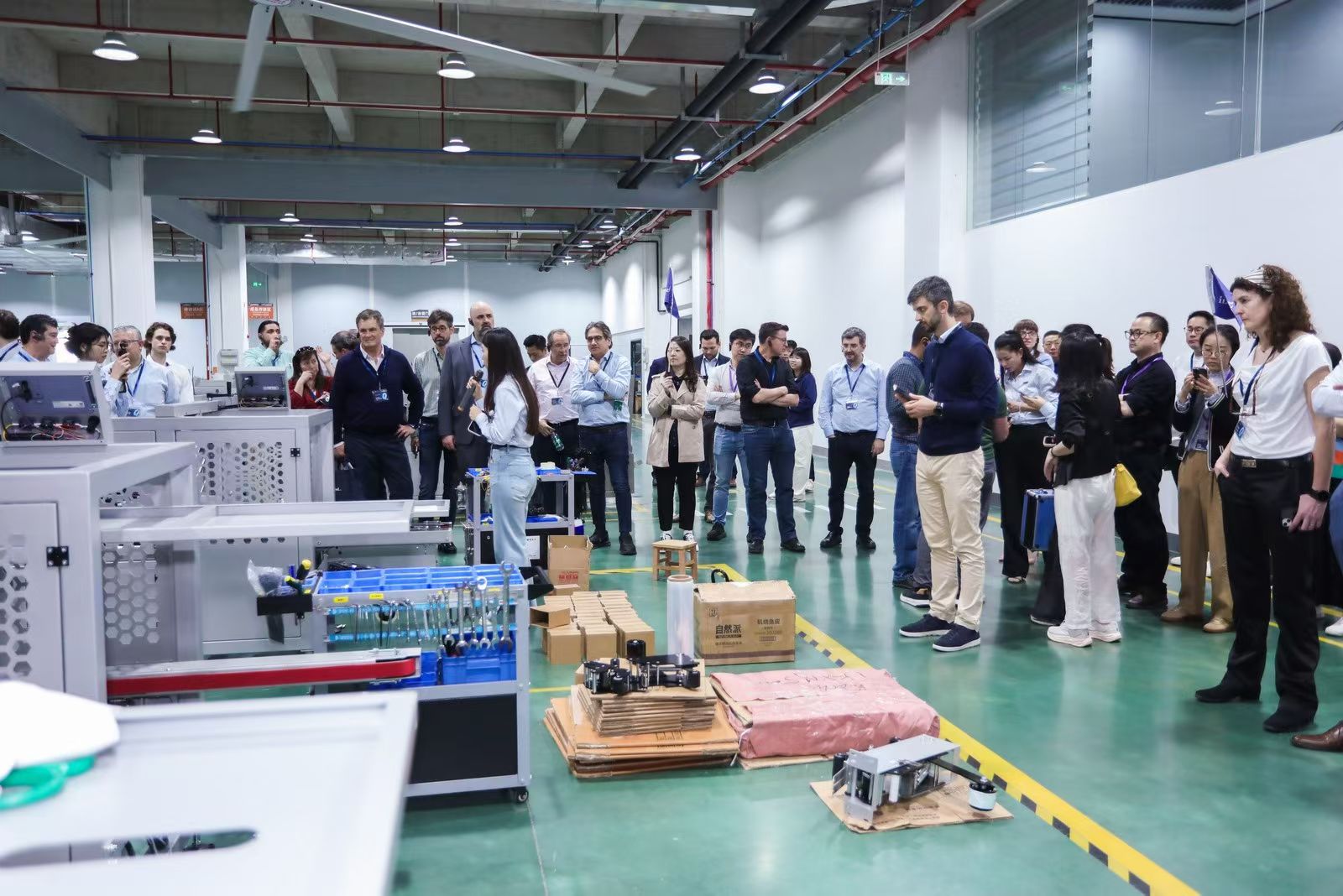 Customer visit and equipment demonstration on the factory floor